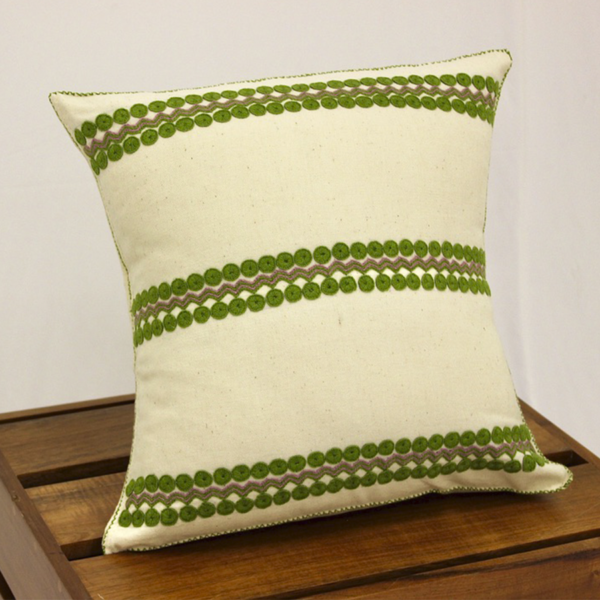 Mexican Telar Cushion with green details.